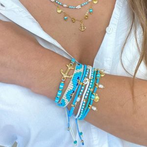 Juego Aretes y Pulseras Celeste Ancla