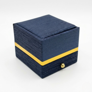 Caja para joyas color azul con botón pequeña