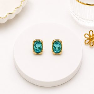 Zarcillos de Circon Color Celeste, Oro Laminado Viennios 18k cierre de Omega