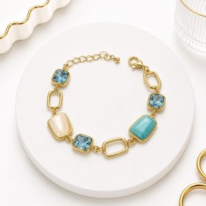 Pulsera de piedra turquesa y blanca ojo de gato y circón Oro Laminado 18k