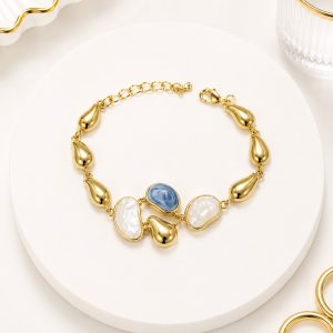 Pulsera de Ojo de Gato  Color celeste y Blanco Oro Laminado 18k